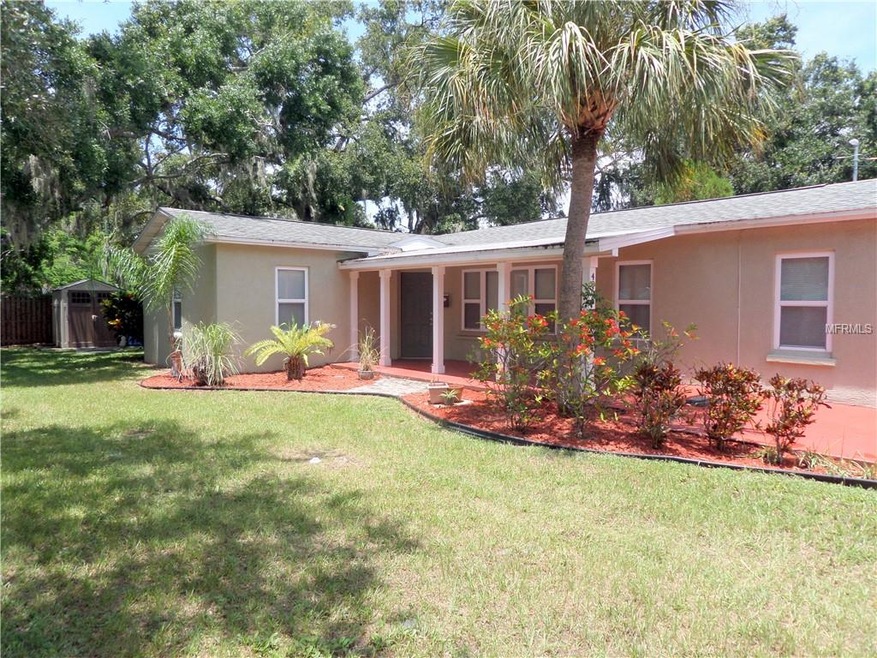Looking at south side of home with entry walkway a