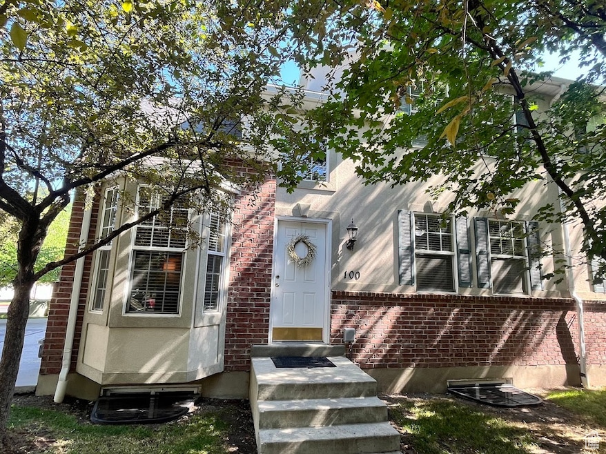 View of front facade featuring brick siding