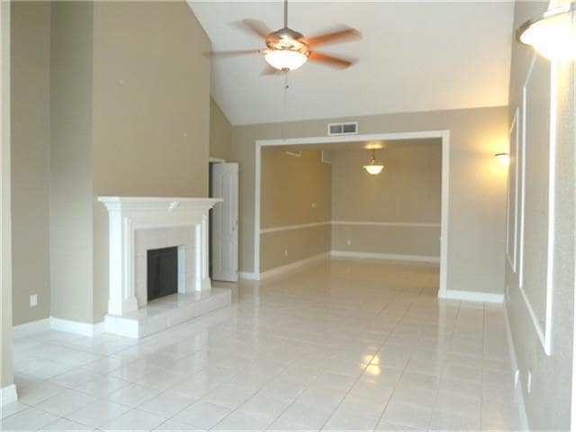 Large Living Space features cathedral ceiling & Wo