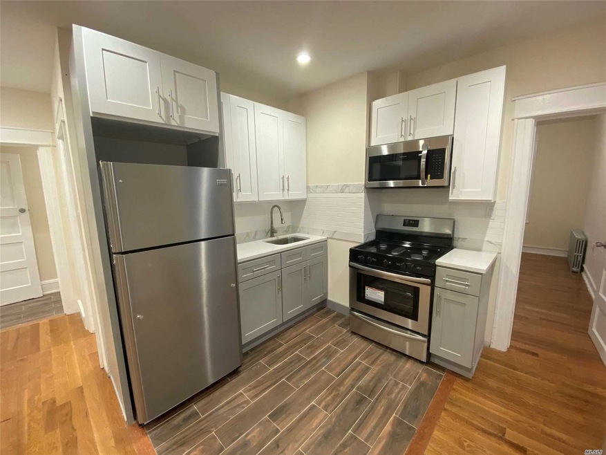 10819 101st Ave unit 2, South Richmond Hill, NY 11419 - photo 1