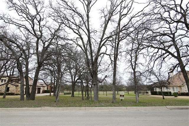 Trees galore surround this beautiful home site.