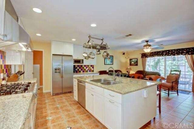Gourmet kitchen with six burner gas stove