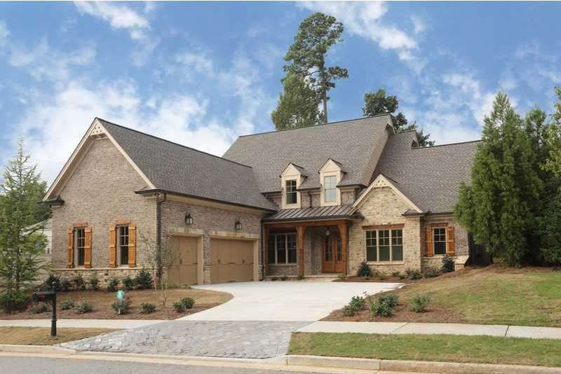 Exterior Front. Stained board & batten shutters, s