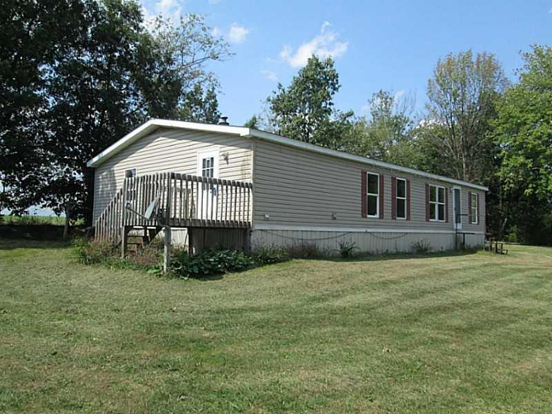 Exterior Front. 13 year old home on 7/10 of an acr