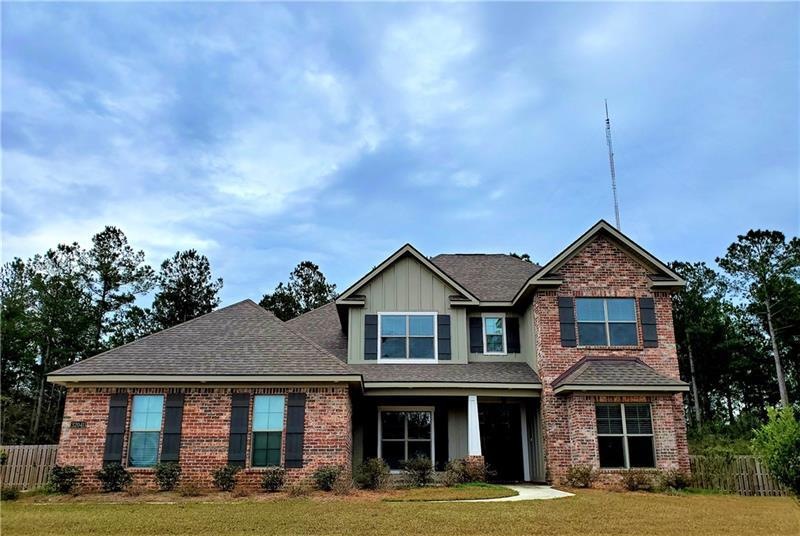 Beautiful brick home in Stonebridge at 32041 Bobwhite sits at the end of a quiet cul-de-sac, but walking distance to community area with pool and playground