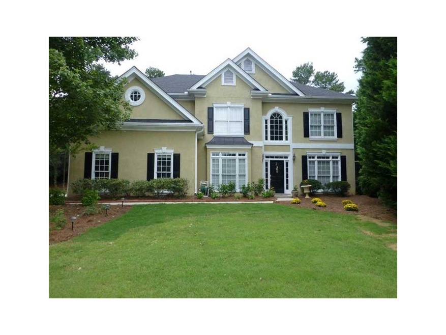 Exterior Front. Hardcoat stucco home nestled on cul-de-sac
