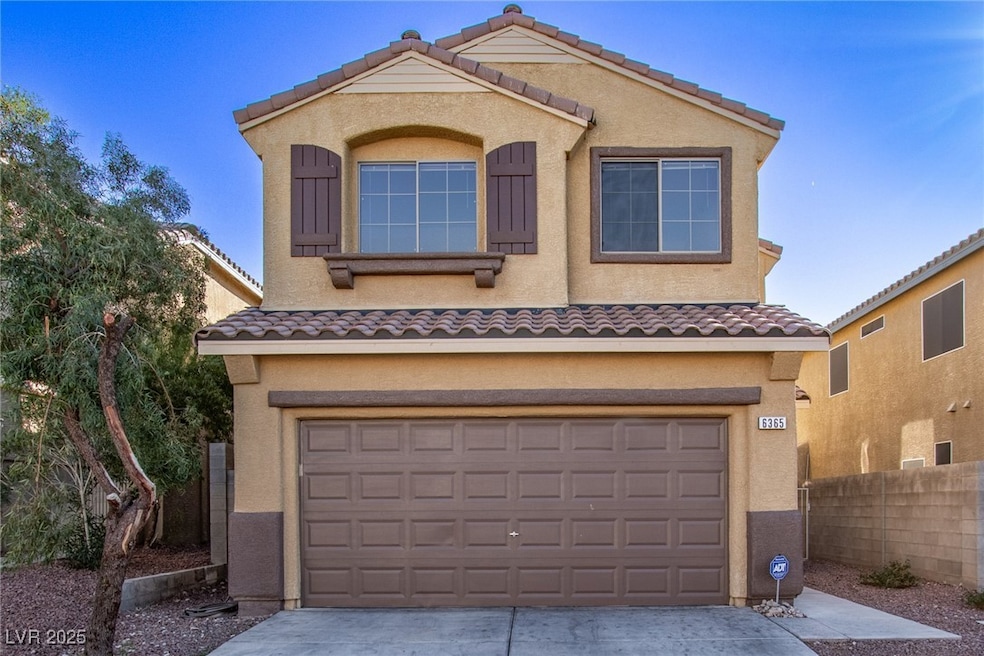 View of front of property featuring stucco siding,
