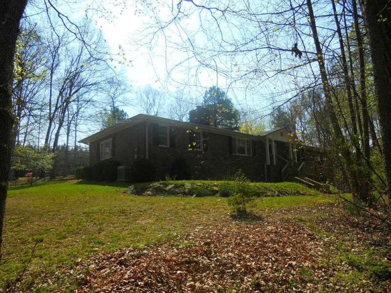 Other. Front of colonial-style all brick ranch hom
