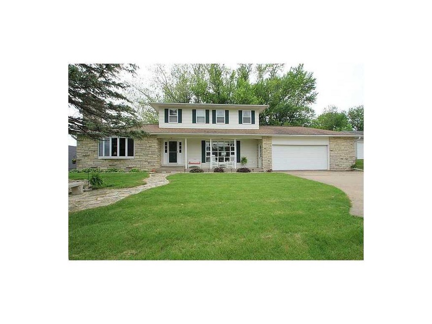 Facade/Exterior Front. Inviting curb appeal. Enjoy