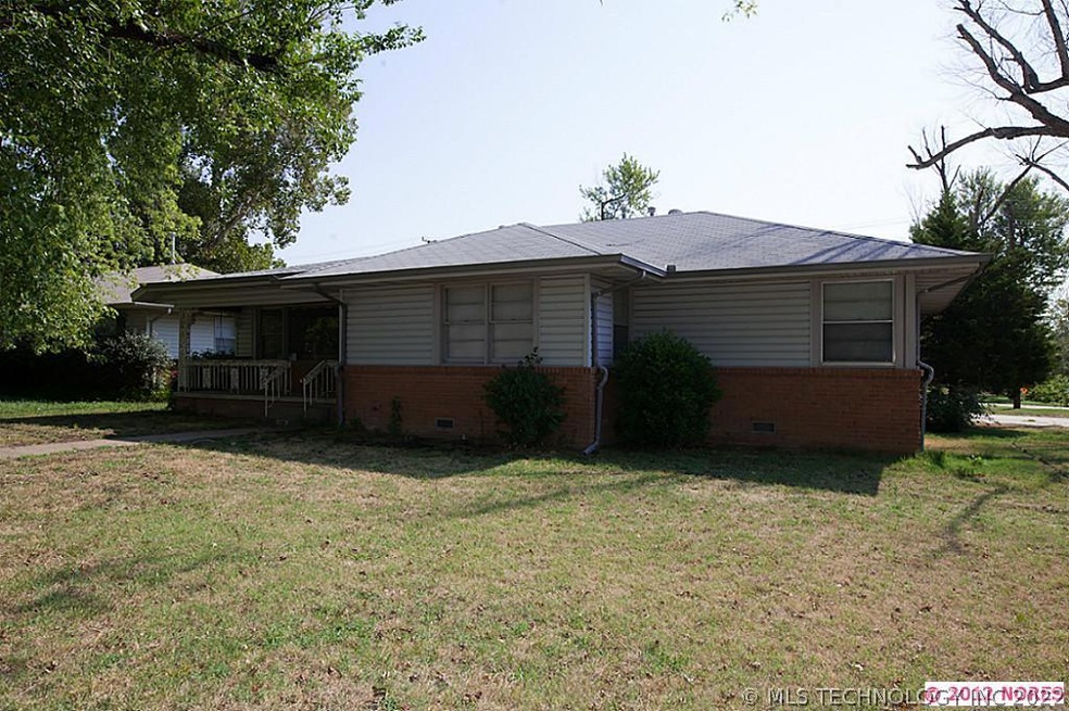MIdtown Ranch on a Corner Lot with side entry driv