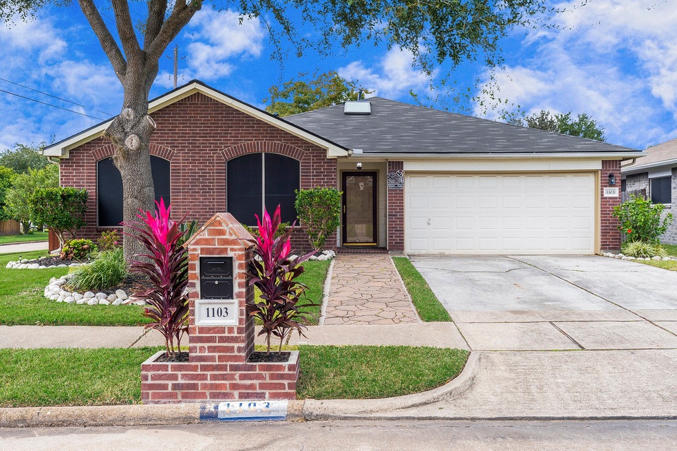 Corner lot with double driveway, landscaping, solar screens. NEW ROOF and AC 2019