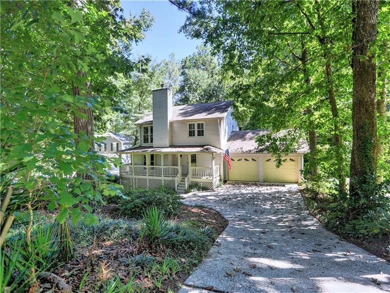 A large Rocking Chair Front Porch Welcomes you to 