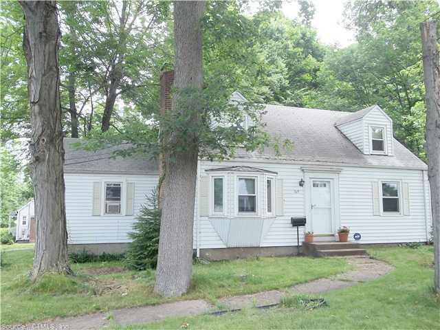 Exterior Front. Newer windows and aluminum siding.