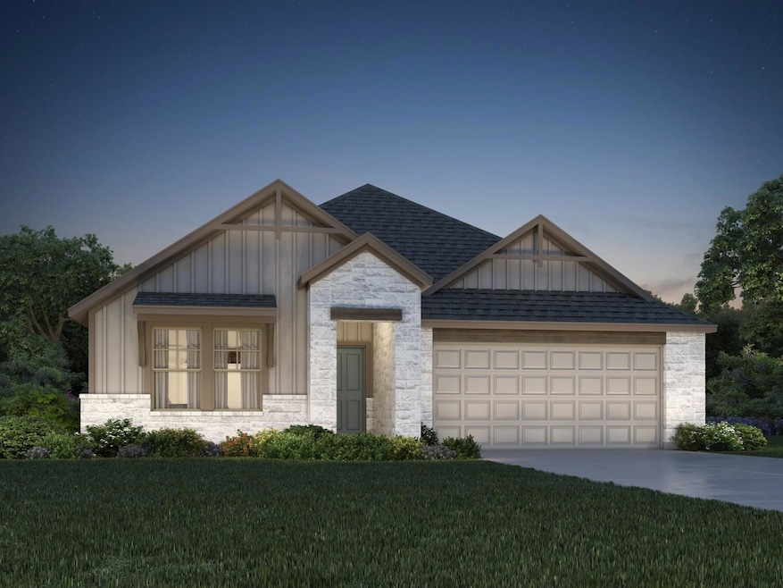 View of front of property with board and batten s