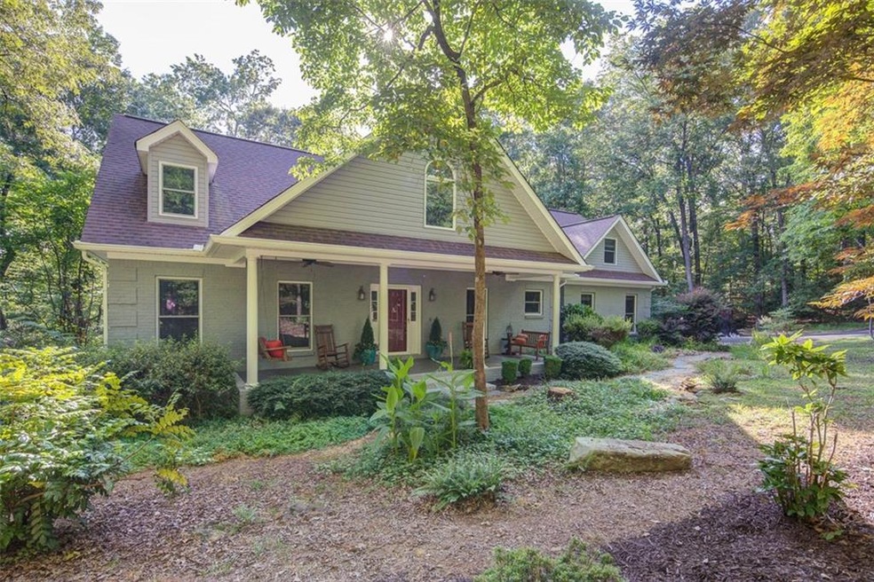 Beautiful Natural Landscaping surrounding Front Ex