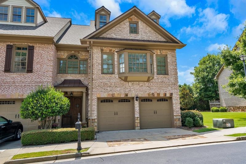 Exclusive All Brick End Unit Townhouse.