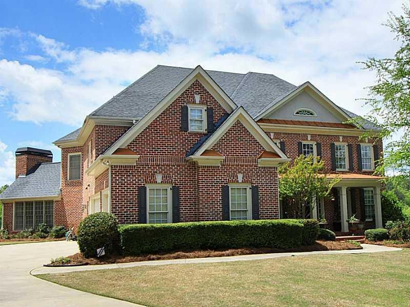 Exterior Front. Beautiful brick home with inviting