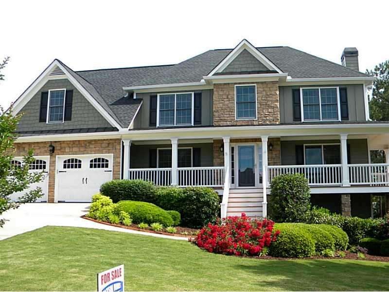 Exterior Front. Beautiful landscaped yard.