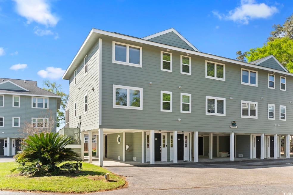 View of front of house with aphalt driveway and a 