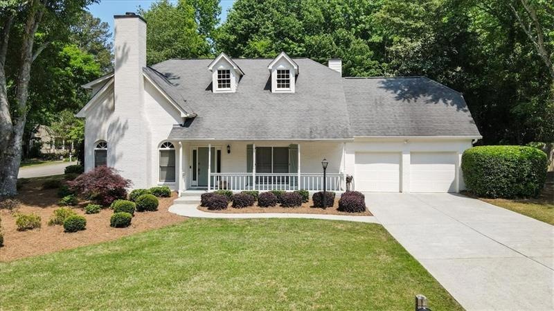 look at that curb appeal!  brick front with so muc