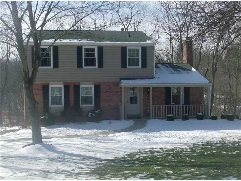 Exterior Front. New siding, gutters, downspouts, t