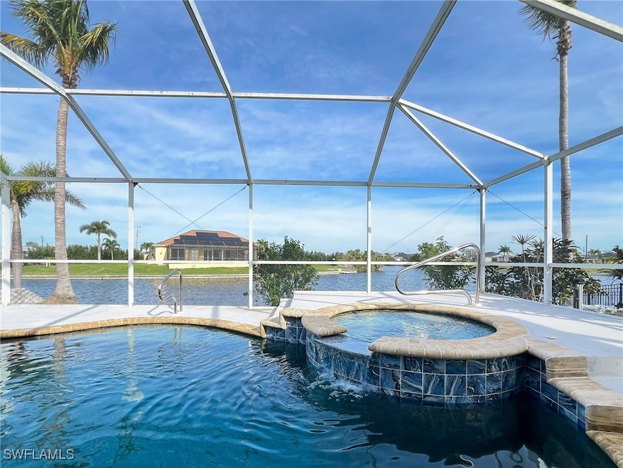 View of swimming pool with a water view, a pool wi