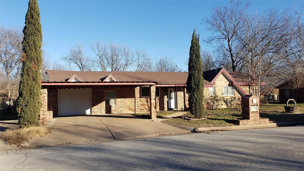 Ranch-style home with a garage