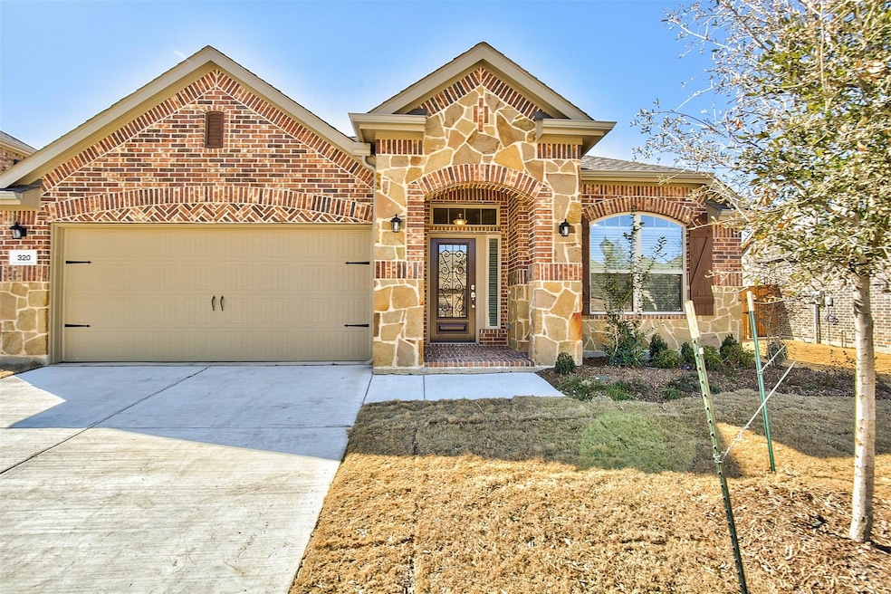 View of front facade with a garage