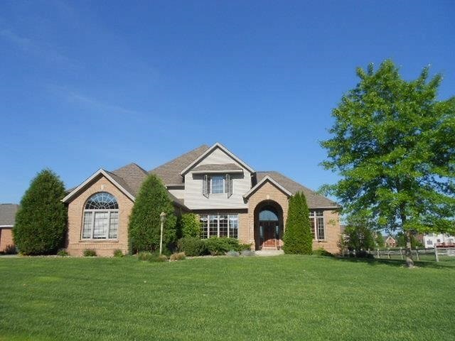 Situated on Lake Heatherton in Covington Shores
