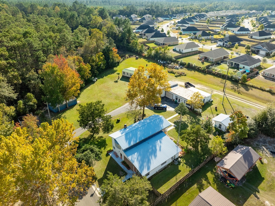 176 Bourbon St, Freeport, FL 32439 - photo 1