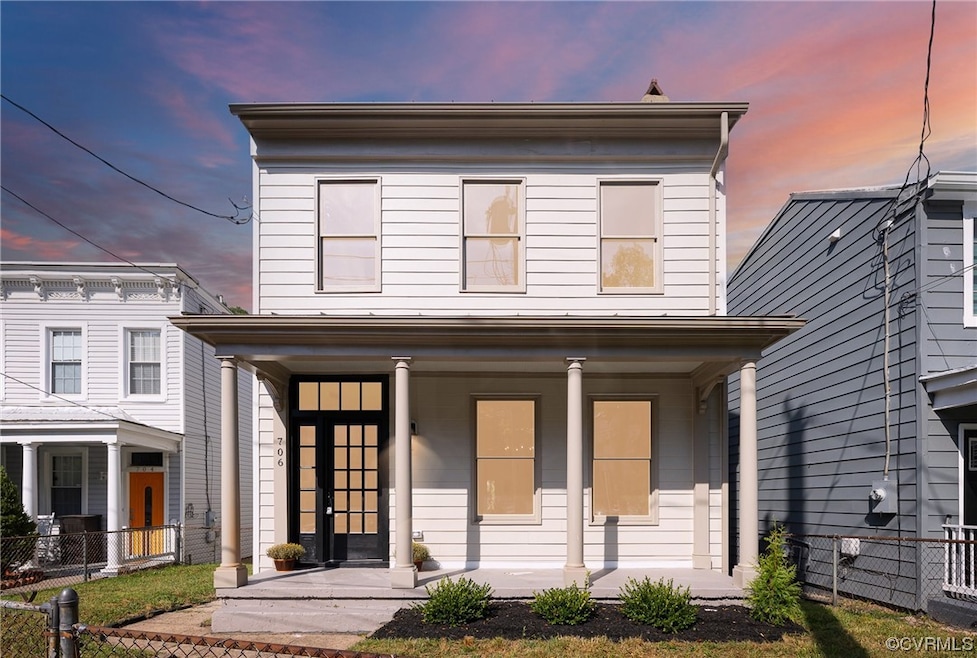 View of front facade featuring a porch