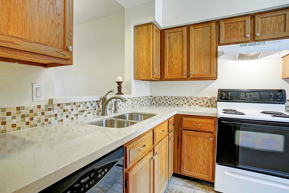 Updated countertops and backsplash, and a pass-thr