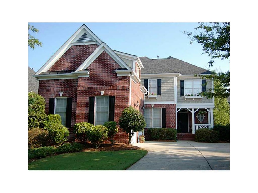 Exterior Front. Fantastic curb appeal with side en