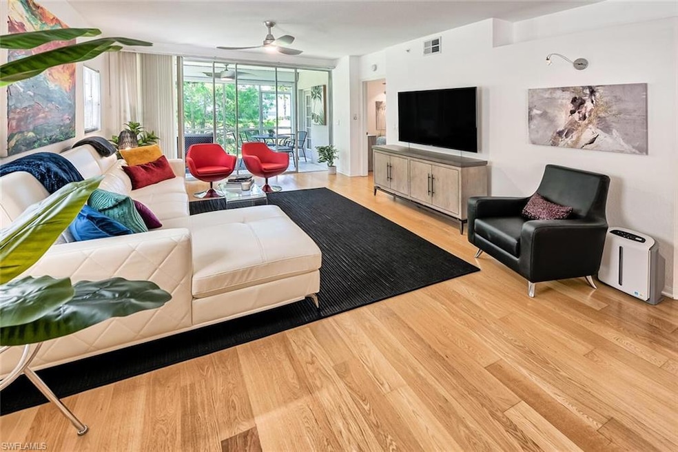 Living room featuring light hardwood / wood-style 