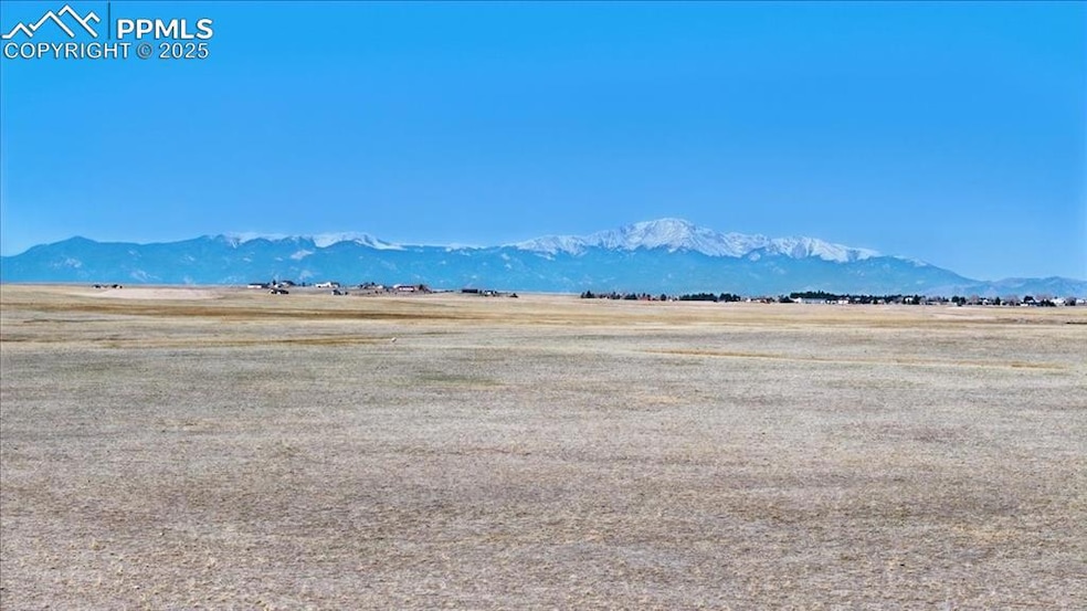 Property view of mountains with a rural view