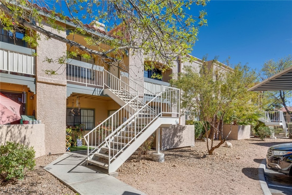 View of property featuring stairway