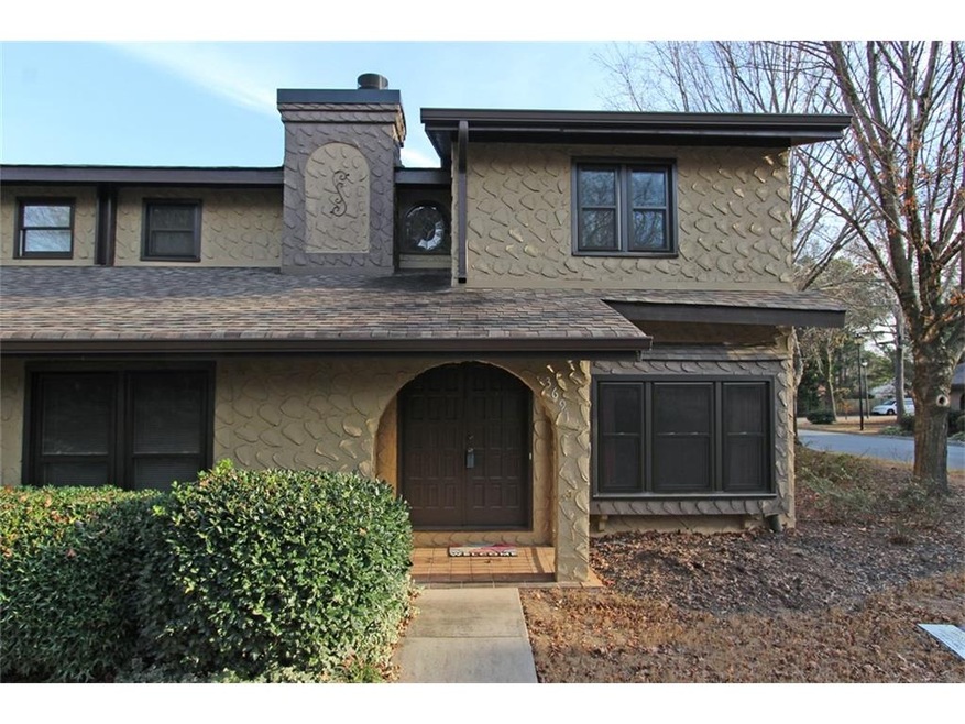 NEWLY PAINTED EXTERIOR ON THIS SPACIOUS END UNIT!
