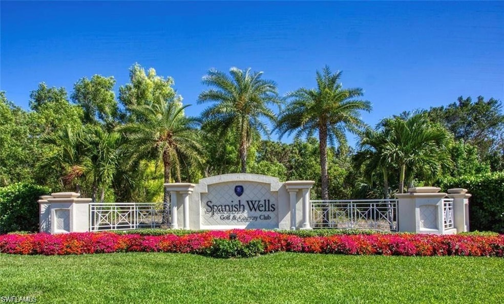 Community sign featuring a lawn