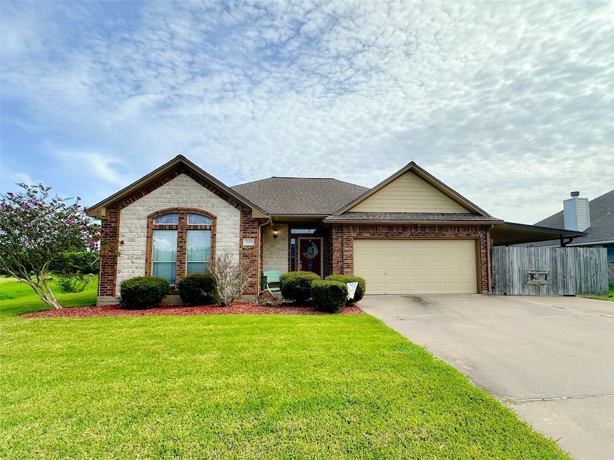This home is complete with a TRIPLE wide driveway
