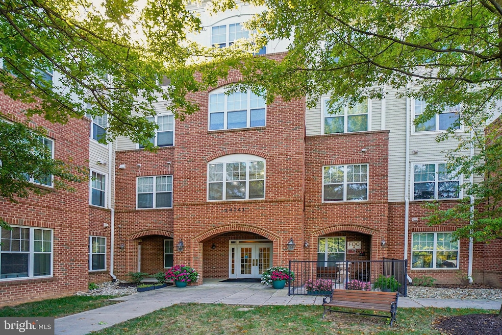 14241 Kings Crossing Blvd unit 108, Boyds, MD 20841 - photo 1