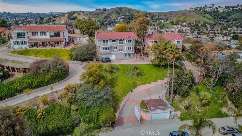 Garage at the bottom of entrance belongs to subject property.