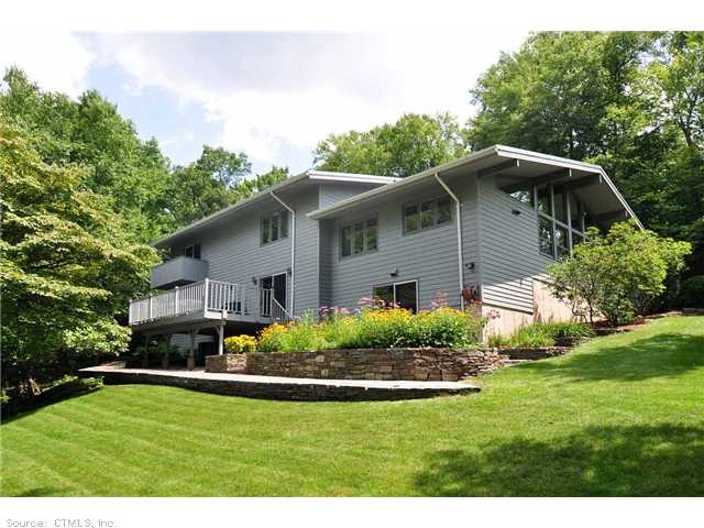 Exterior Back. Private and serene setting. Minutes