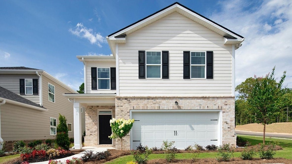 This spacious four-bedroom 2.5-bath single -family