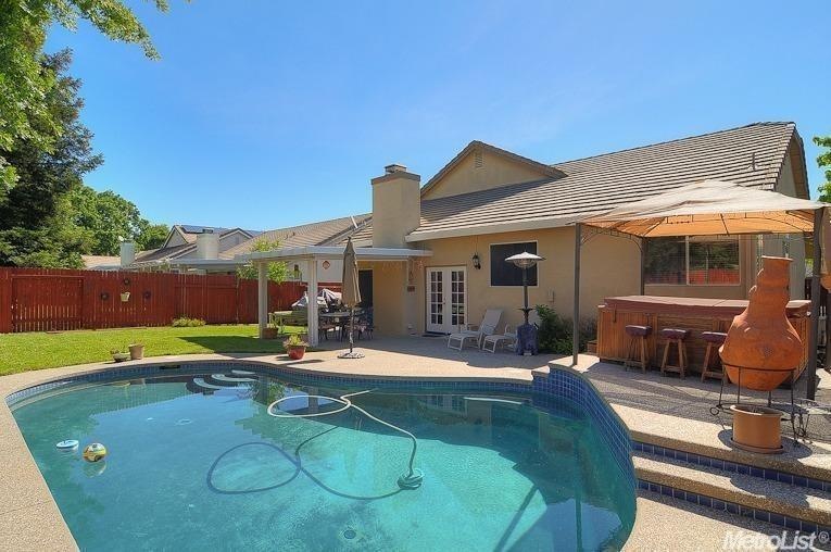 It's all here - built in pool, covered patio with 