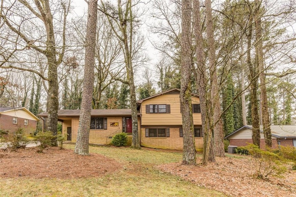 Wooded and private front yard