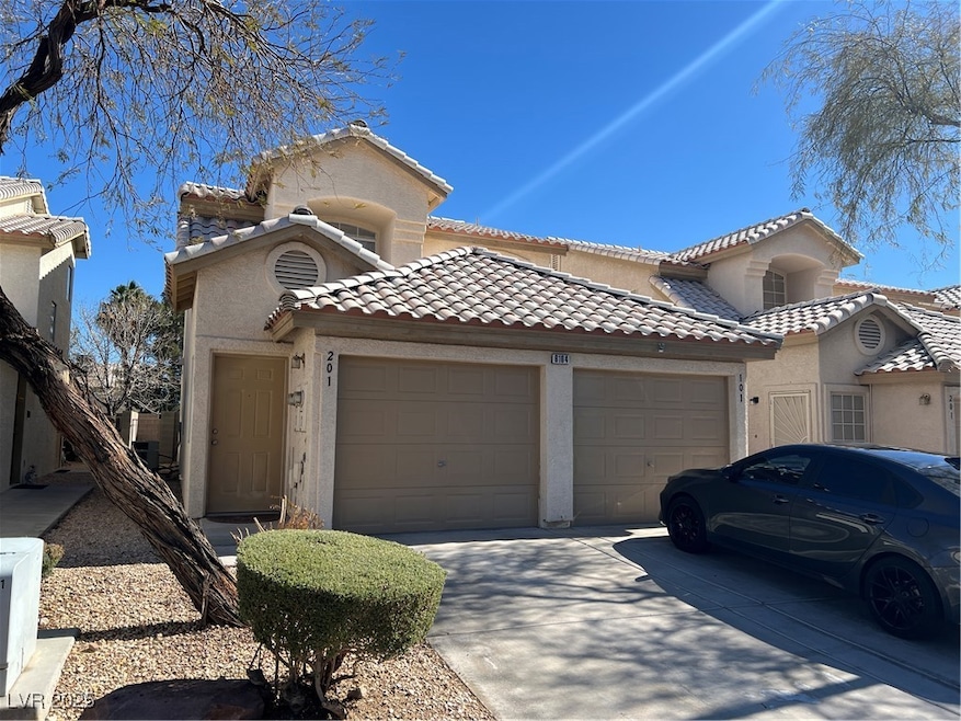 Mediterranean / spanish-style home W/1 car garage