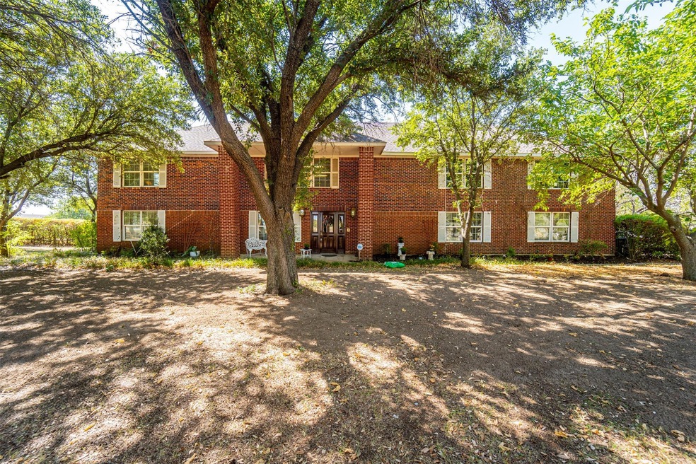 Welcome home to 4001 Hampton - 3200 sq ft on 1.1 acres in Ranch Estates!