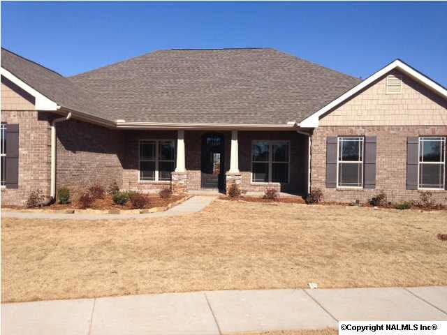 Full brick on large Corner homesite,3 car side enrty garage w/ separate section for shop, Hardi board trim, Full sod, sprinkler system w/ separate meter, Platinum award winner for most enegry efficient Builder in Madison County!
