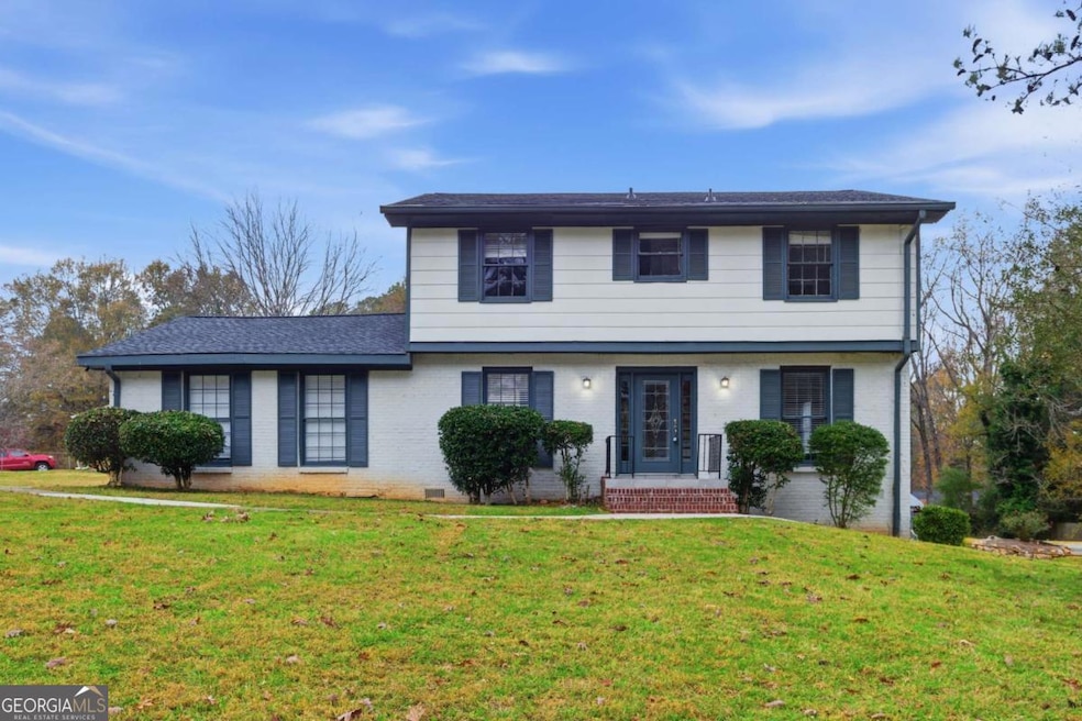 127 Old Rosser Rd SW, Lilburn, GA 30047 - photo 1