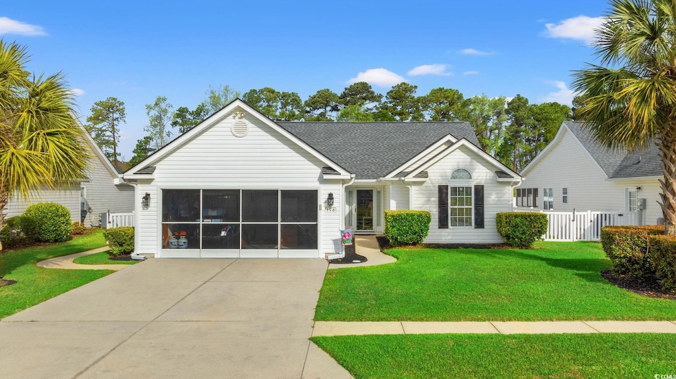 Ranch-style home with a shingled roof, fence, and 